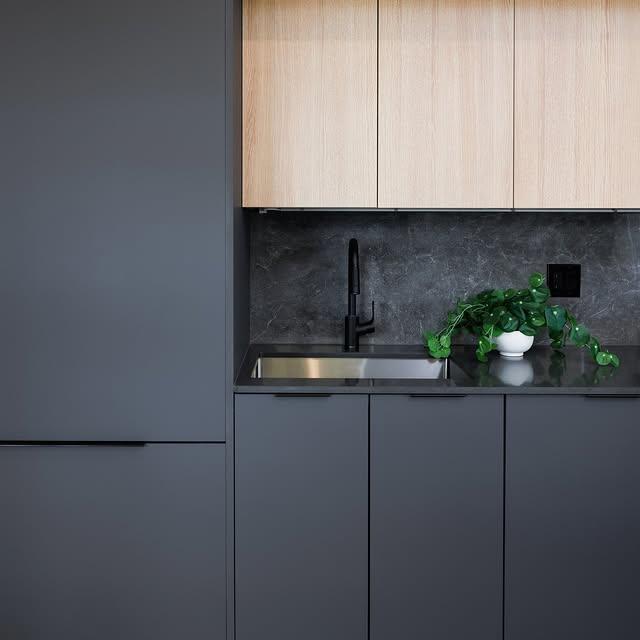 A modern kitchen with hidden appliances